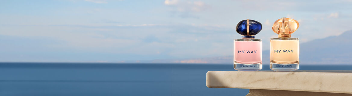 Flacon de parfum Giorgio Armani sur fond metallique brosse.