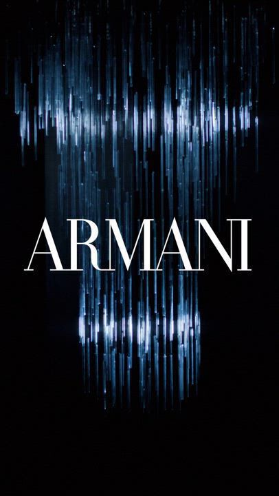 This video showcases Armani Beauty's holiday season collection. It features models at a party, showcasing various makeup products and fragrances. The overall atmosphere is festive and glamorous, with a focus on shimmering lights and elegant attire. The video highlights products such as lipstick, eyeshadow, and perfumes like "Si" and "Stronger With You."