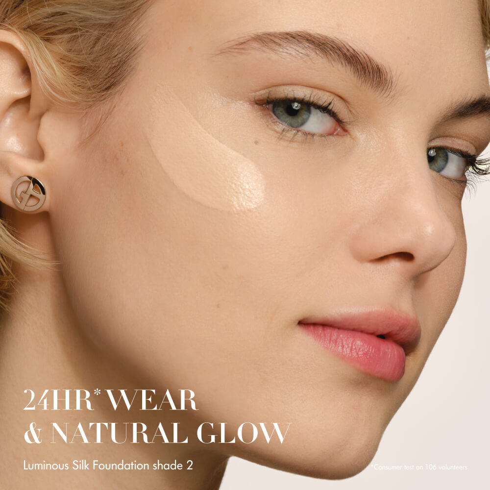 Close-up of a woman's face showcasing LUMINOUS SILK FOUNDATION texture, 24h wear and natural glow