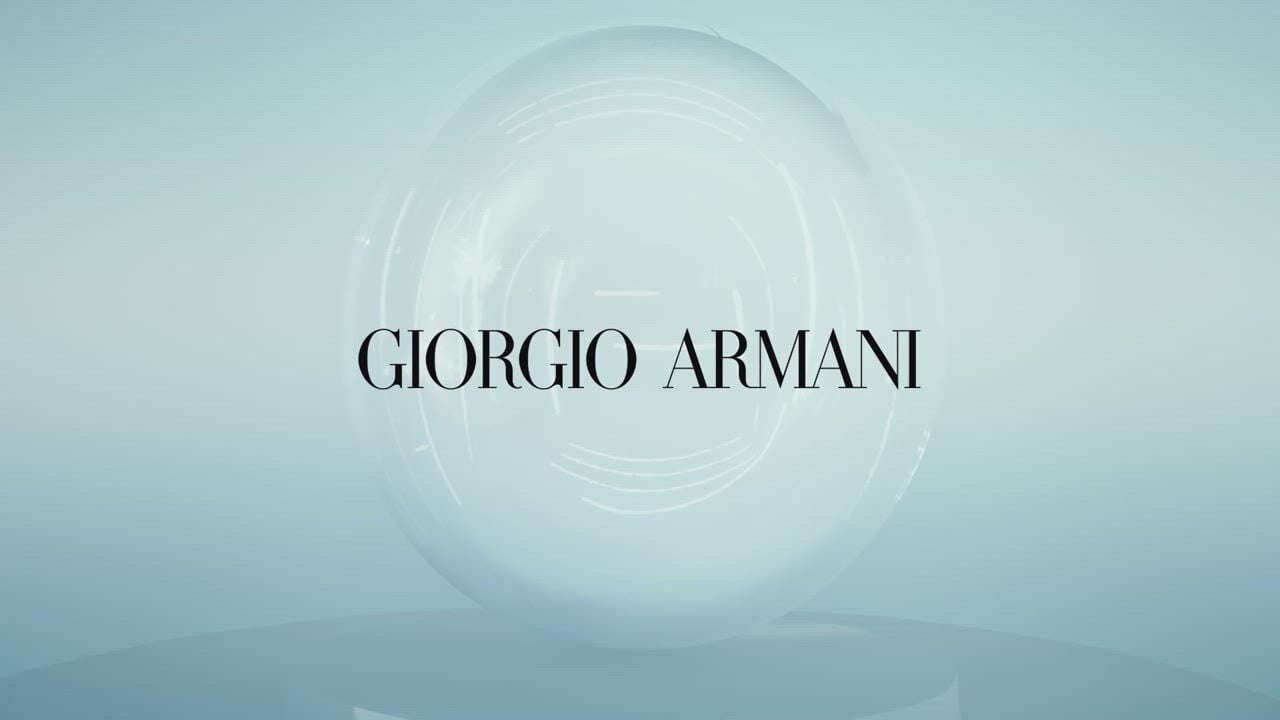 A sleek, futuristic design featuring the text 'Giorgio Armani' against a soft gradient background.
